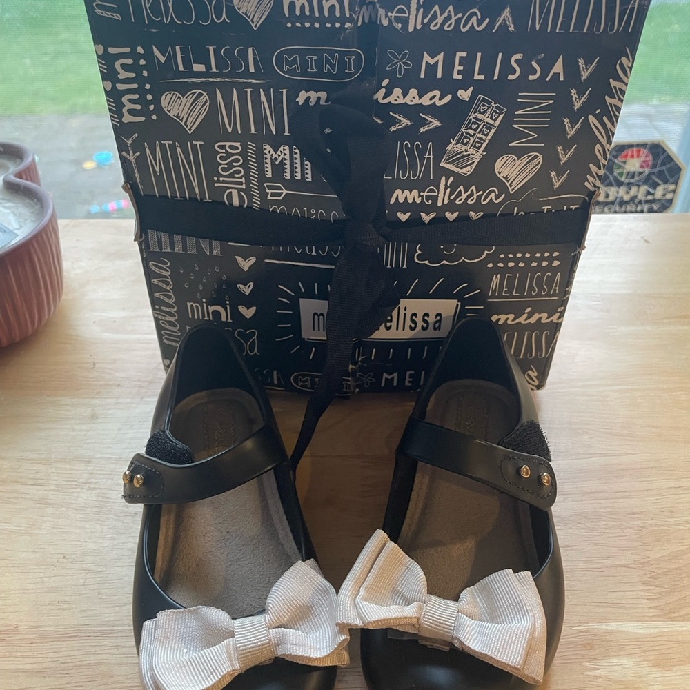 Mini Melissa ultra girl Black Mary Jane Shoes with Cream Bows